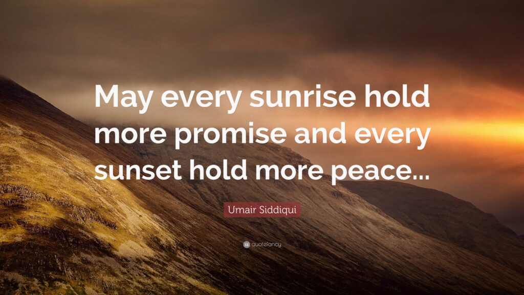 Inspirational quote on a mountain landscape at sunset that says: 'May every sunrise hold more promise and every sunset hold more peace.' – Umair Siddiqui